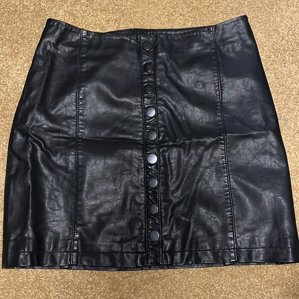 FREE PEOPLE faux leather mini skirt with snaps